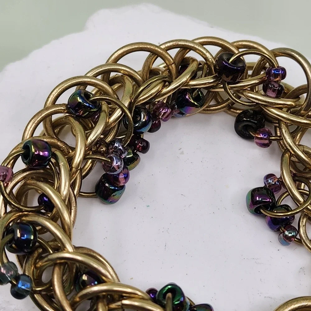 Kenneth Cole Gold Tone Woven Ring Bracelet Purple Bead Chunky Toggle Statement